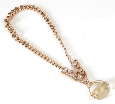 Lot 12 - A 9ct gold graduated curb link Albert chain,...