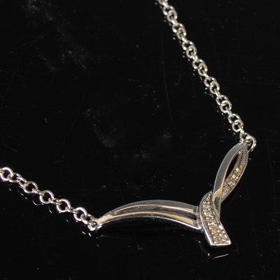 Lot 13 - A 9ct white gold and diamond centrepiece...
