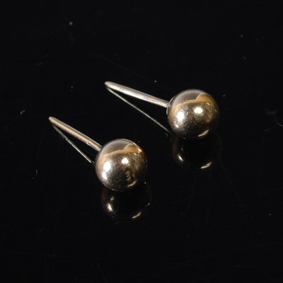 Lot 17 - A pair  of 9ct gold stud earrings, 0.6 grams.