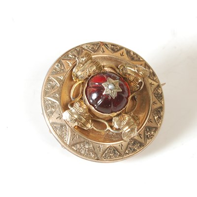 Lot 28 - A Victorian gold, garnet and split pearl...
