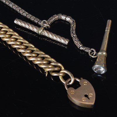 Lot 38 - A gold plated curb link bracelet with heart...