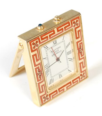 Lot 48 - Halcyon Days Enamels, a travel alarm clock...
