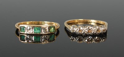 Lot 61 - A yellow gold emerald and diamond five stone...