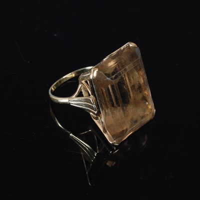 Lot 70 - A 9ct gold single stone smoky quartz dress...
