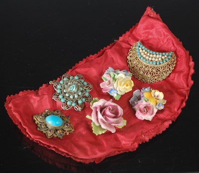 Lot 87 - Three ceramic flower brooches; together with...