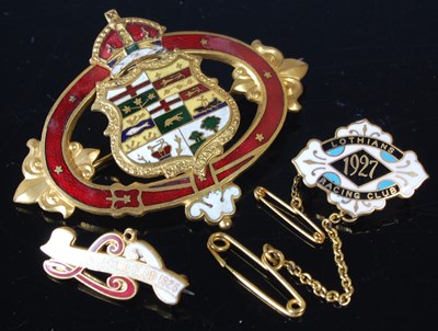 Lot 90 - A group of three gilt metal and enamel badges,...