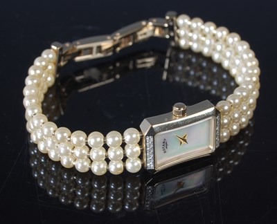 Lot 97 - A ladies Rotary gold plated and mother of...