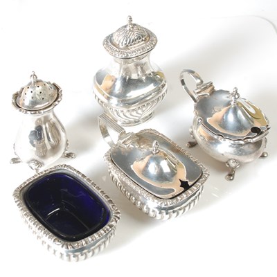 Lot 105 - A Birmingham silver three piece cruet set,...