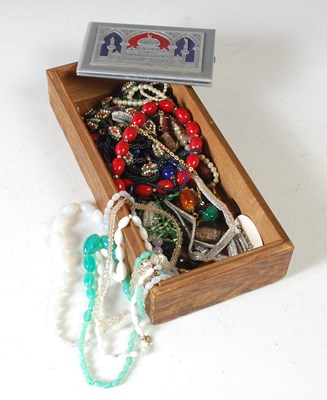 Lot 137 - A box of assorted costume jewellery, necklaces,...