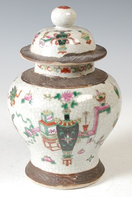 Lot 141 - A Chinese porcelain crackle glaze famille rose...