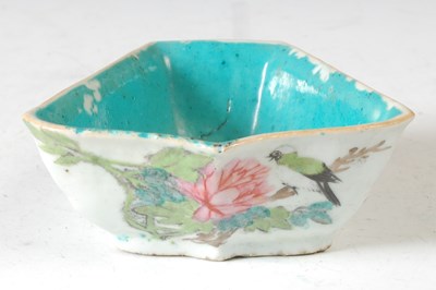 Lot 144 - A Chinese porcelain famille rose lozenge...