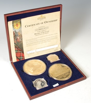 Lot 177 - A cased set of four Windsor Mint gold plated...