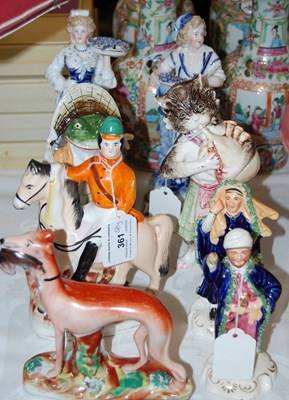 Lot 361 - A group of ceramic figures to include a...