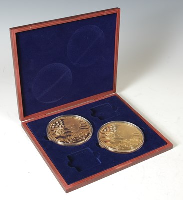 Lot 178 - Two Windsor Mint gold plated cupronickel coins,...
