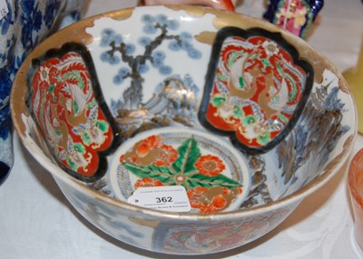 Lot 362 - A Japanese Imari pattern bowl, 25cm diameter