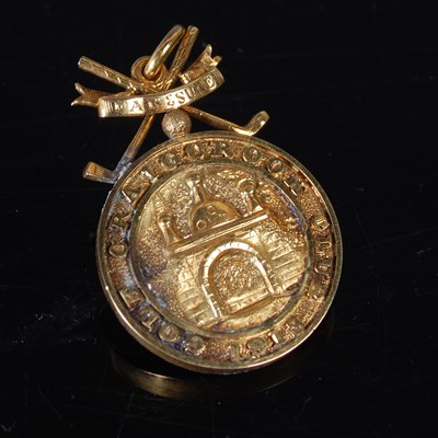 Lot 190 - Golfing interest, a yellow metal, tests as...