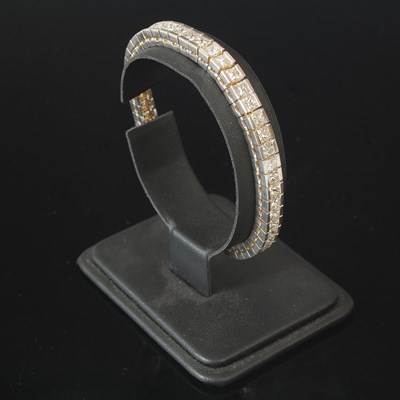 Lot 192 - A white metal diamond set tennis bracelet,...