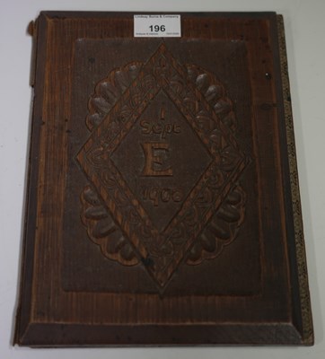 Lot 196 - An Edwardian Arts & Crafts oak desk blotter,...