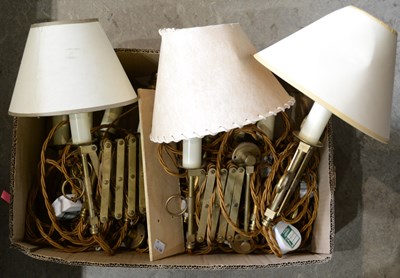 Lot 404 - A box containing eleven brass scissor wall...