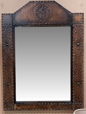 Lot 658 - An early 20th century wall mirror, the frame...