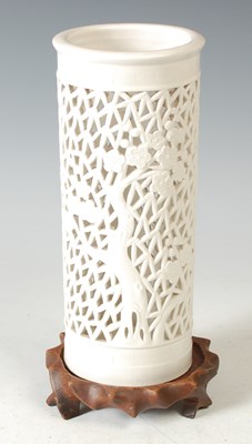 Lot 301 - A Chinese blanc-de-chine reticulated porcelain...