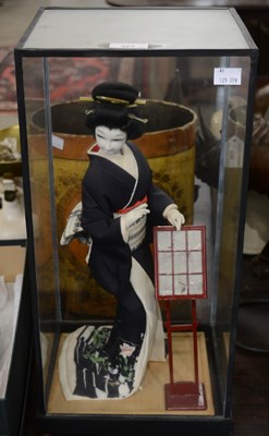 Lot 322 - A Japanese model of a Bijin standing on a...