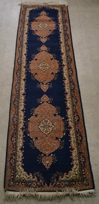 Lot 667 - An Anatolian Ladik blue ground Persian runner,...