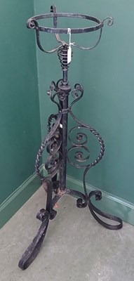 Lot 568B - A 20th century black painted metal jardiniere...
