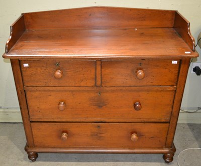 Lot 600 - A 19th century pine two over two chest of...