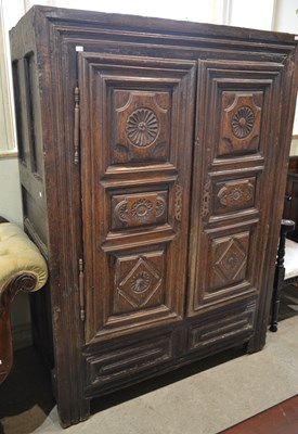Lot 603 - An antique Spanish oak armoire, the two front...