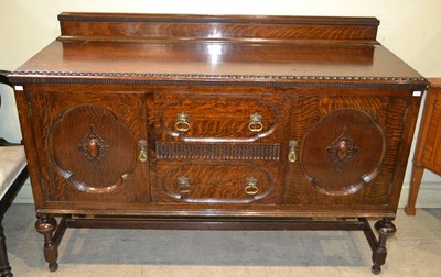 Lot 607 - An early 20th century oak sideboard in the...