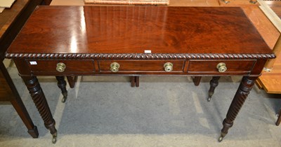Lot 625 - A Regency style mahogany side table, the rope...