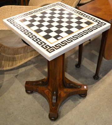 Lot 629 - A 19th century rosewood marble topped chess...