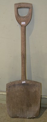 Lot 610 - A 19th century wooden grain shovel, 101cm long.