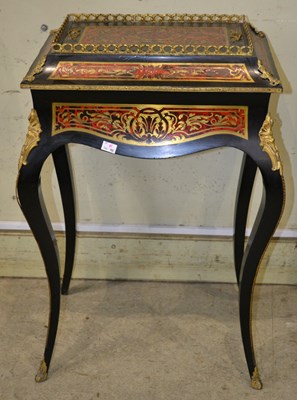 Lot 651 - A 19th century French Boulle red tortoiseshell...