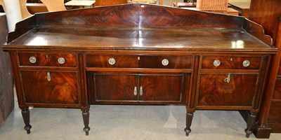 Lot 659 - A Regency style mahogany sideboard of large...