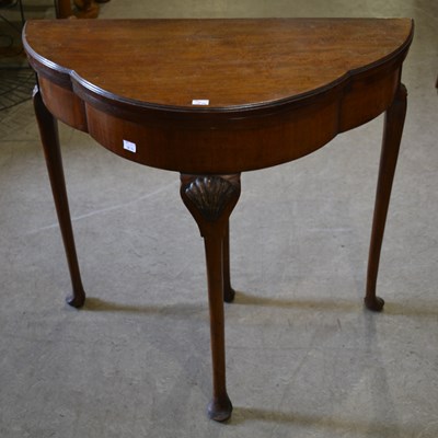 Lot 647 - A 19th century mahogany demi lune card table,...