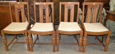 Lot 678 - A set of four early 20th century oak dining...