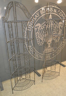Lot 682 - A pair of 20th century black painted wrought...