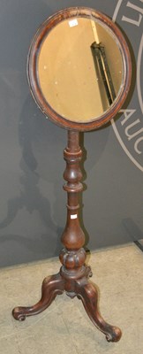 Lot 677 - A 19th century mahogany shaving stand, the...