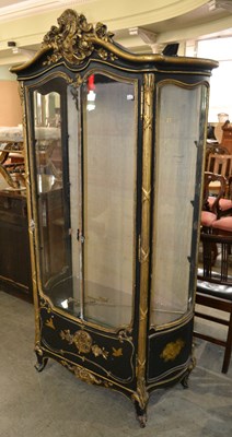 Lot 730 - A Louis XV style vitrine, the interior with...