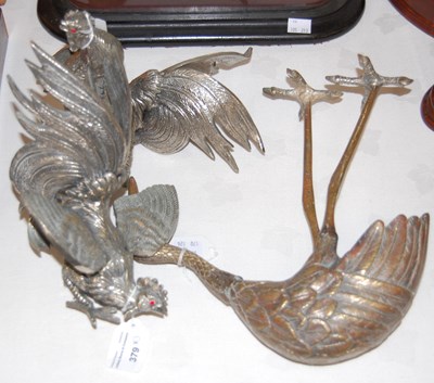 Lot 379 - A near pair of white metal table cockerels...
