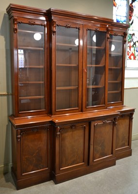 Lot 765 - A 19th century mahogany breakfront bookcase,...