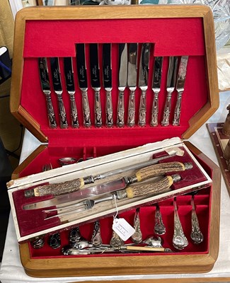 Lot 363 - A three piece carving set in Harrods of London...