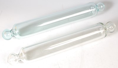 Lot 362 - Two clear glass rolling pins, possibly by...