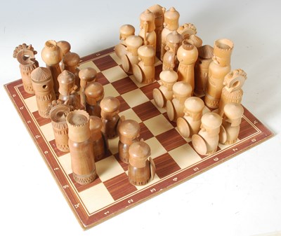 Lot 365 - A 20th century chess set, modelled with wooden...
