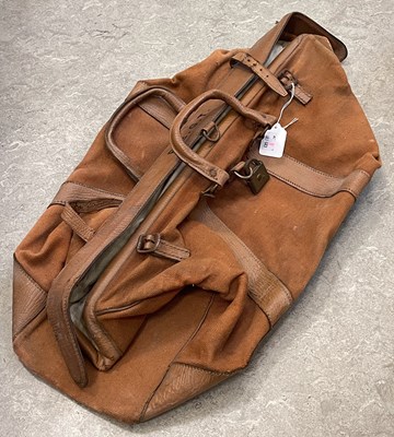 Lot 496 - A vintage large tan leather and brown canvas...