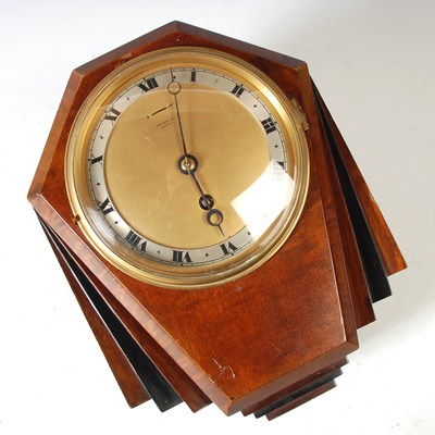 Lot 286 - An Art Deco style wall clock by Rattray & Co.,...