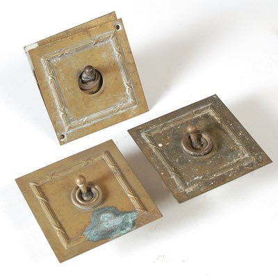 Lot 211 - A group of three early 20th century toggle...