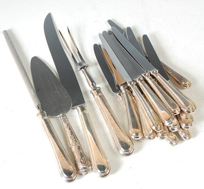 Lot 224 - A group of assorted silver handled flatware,...
